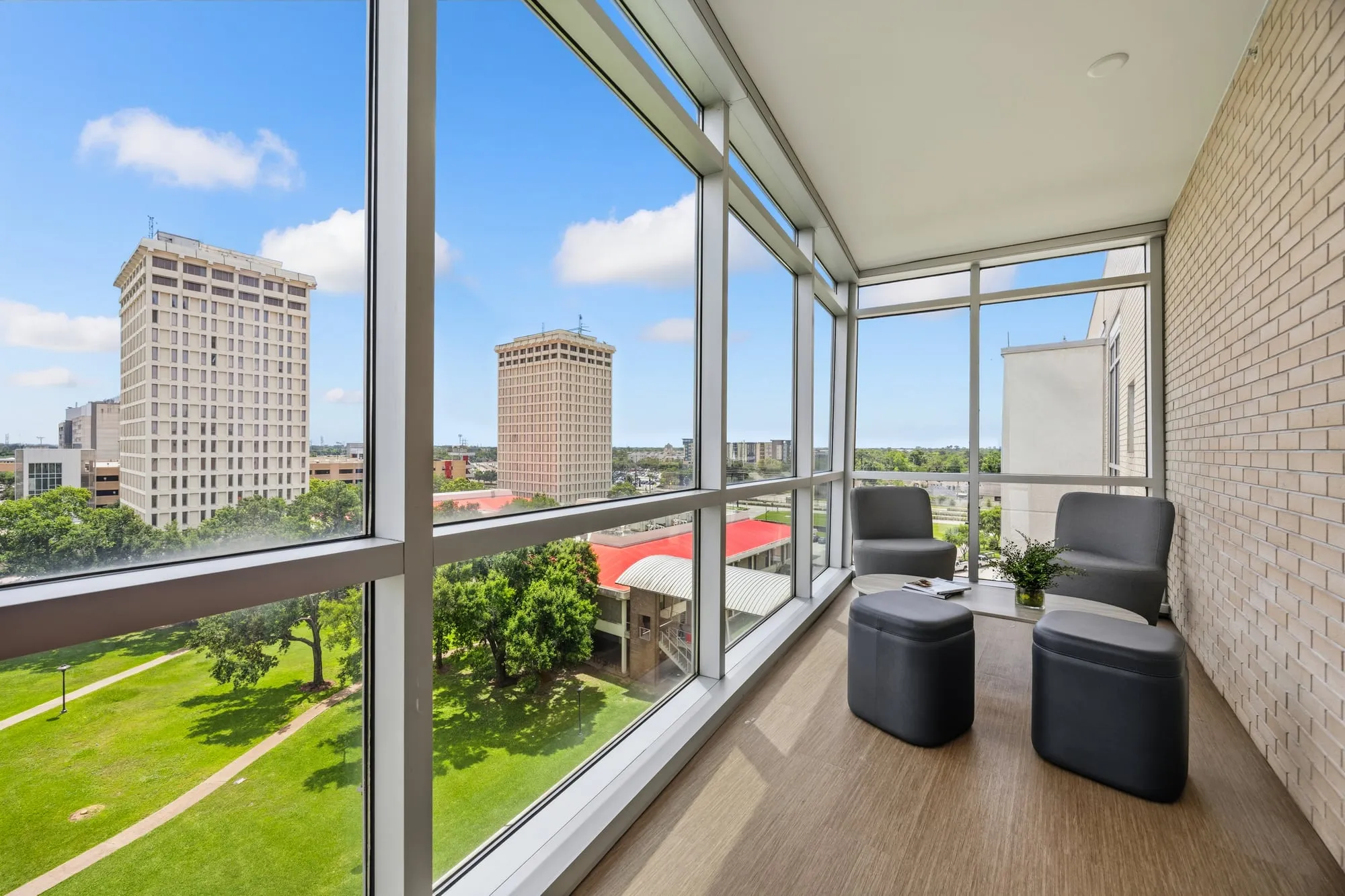 Corner lounge with a skyline view at the University of Houston student housing